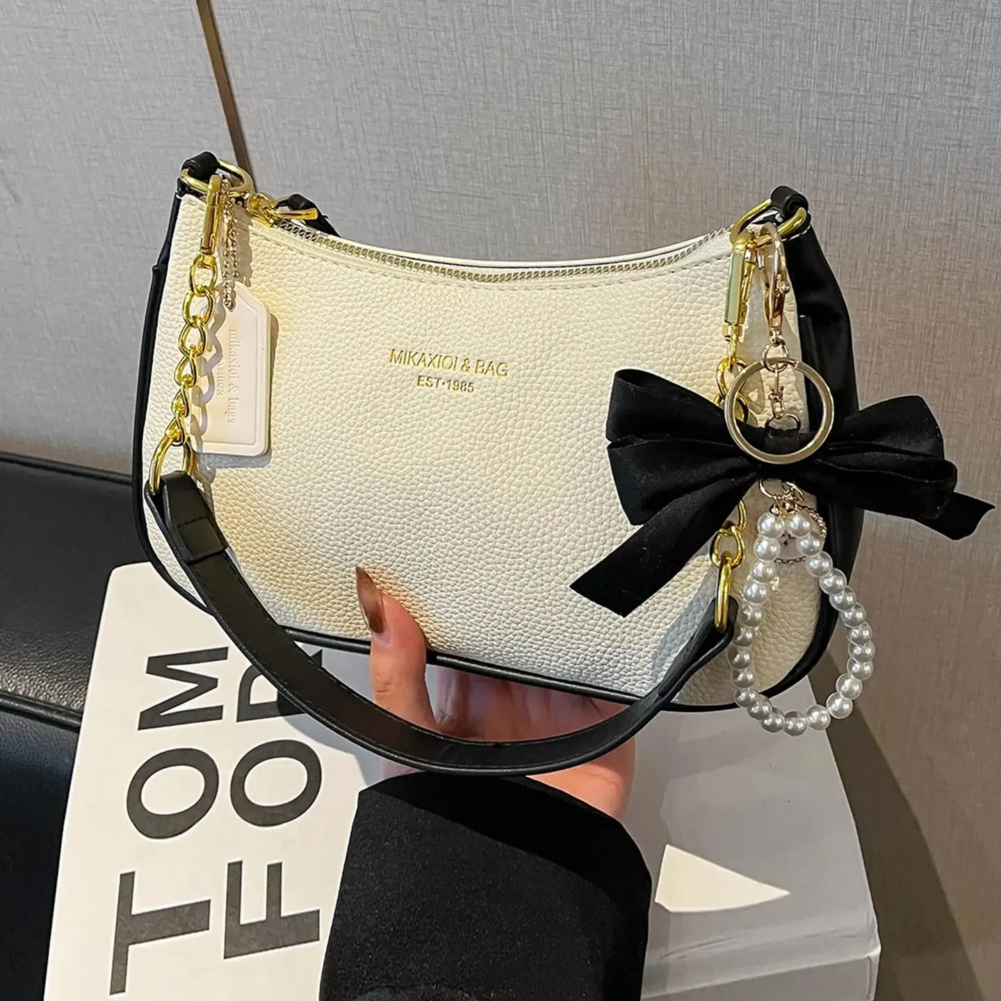 

Сумка на плечо для женщин 2026: Новая изысканная универсальная сумка через плечо с бантом из текстурированной искусственной кожи для повседневного использования