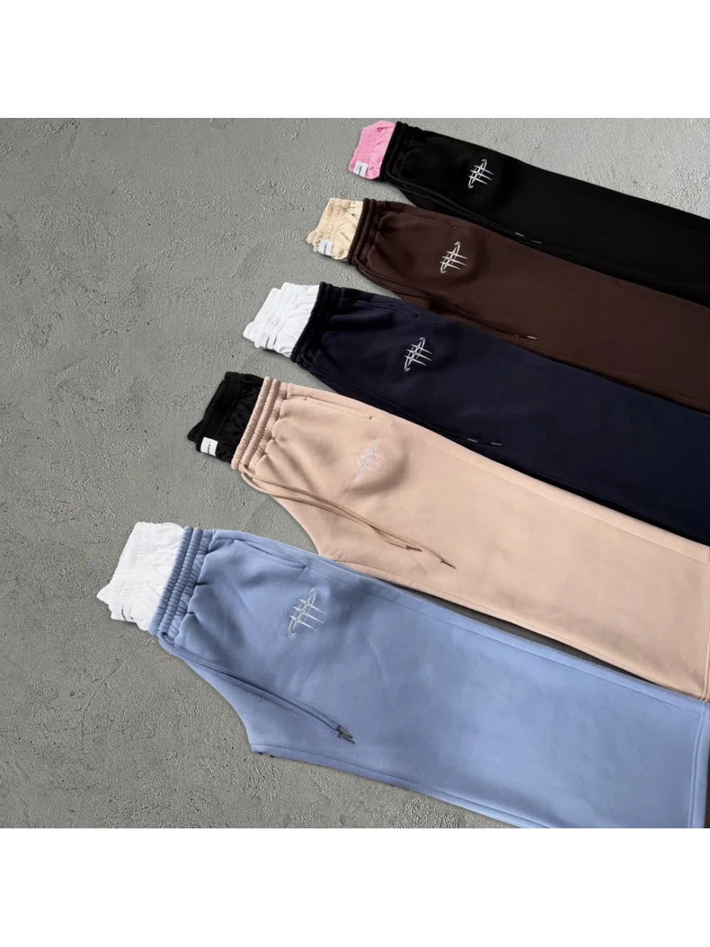 Pantaloni sportivi a doppia vita casual larghi hip-hop da strada retrò americani Pantaloni sportivi in due pezzi finti unisex