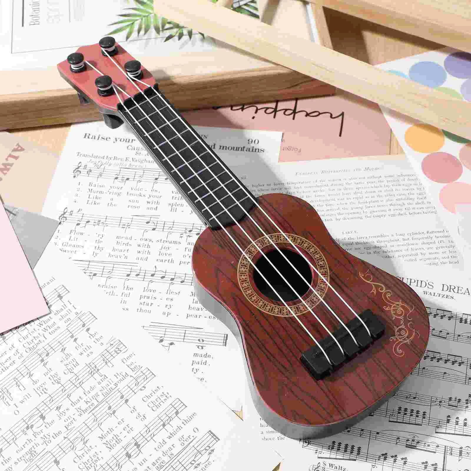 Giocattoli per ragazzi Mini Ukulele Strumenti per bambini Modello in plastica Bambini Giocattoli beige