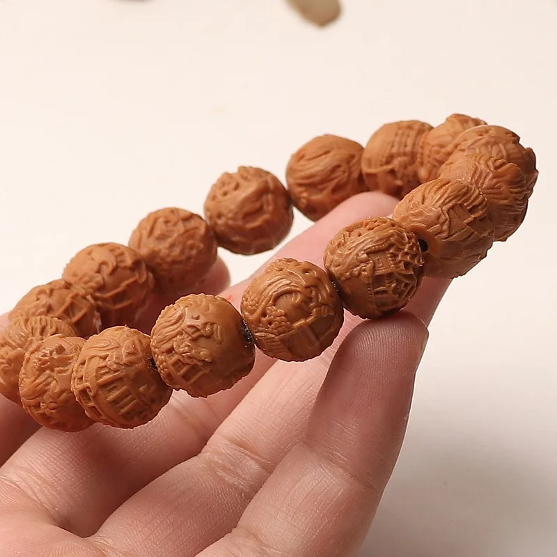 relief of monkey head , Suzhou garden scenery, fully natural walnut hand-carved bracelet