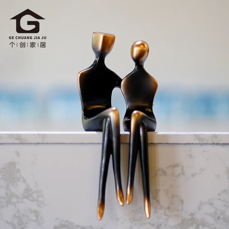

Modern abstract figure couple sculpture table edge decoration sales office living room home TV cabinet door hall decoration
