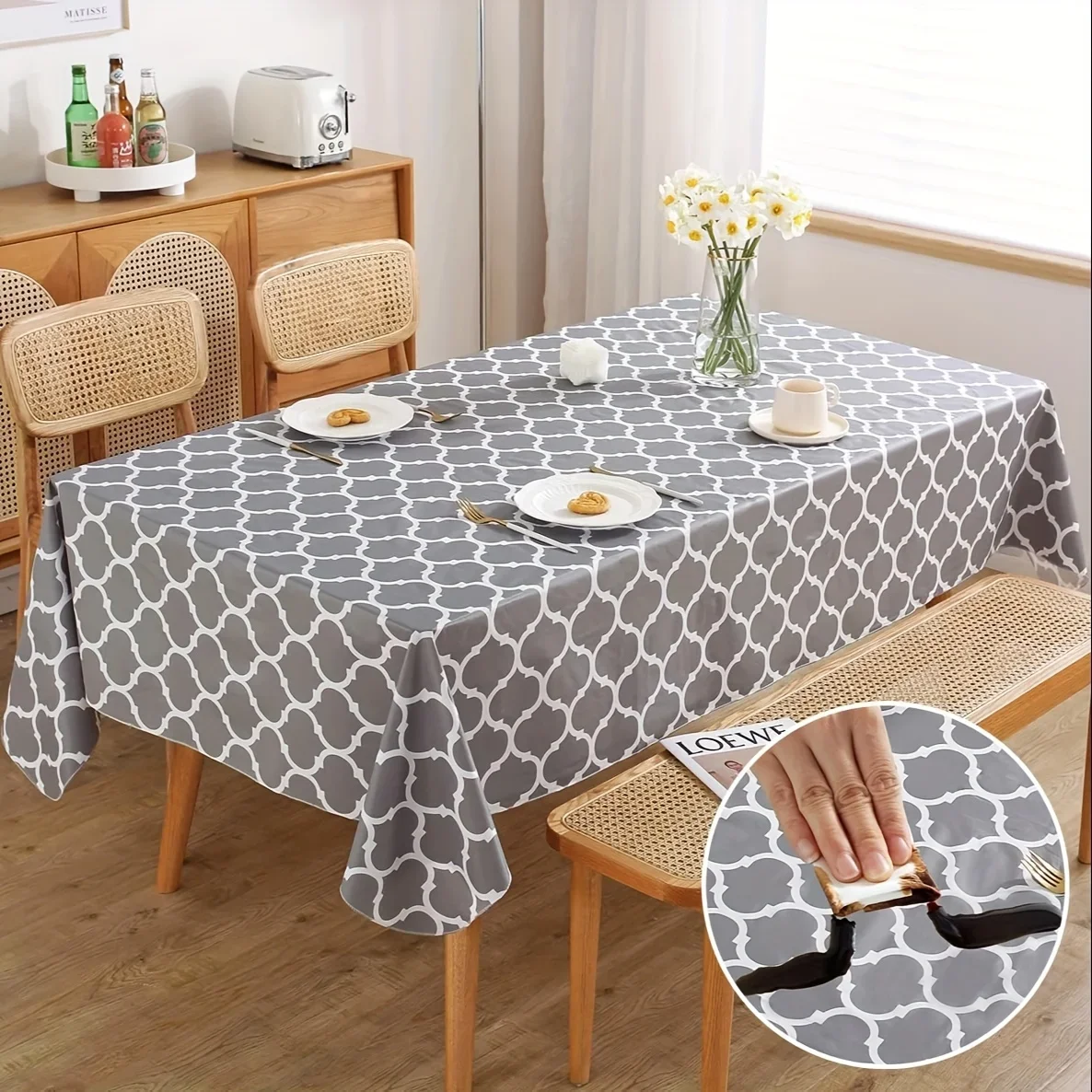 Easy-to-clean thick rectangular vinyl tablecloth with flannel backing, 60 inches * 84 inches / 52 inches * 70 inches in black.