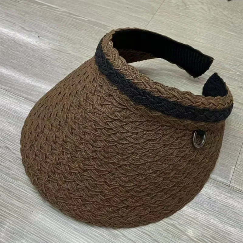 A simple black lace-up straw-woven hollow top hat for women's sunshade and rare versatile