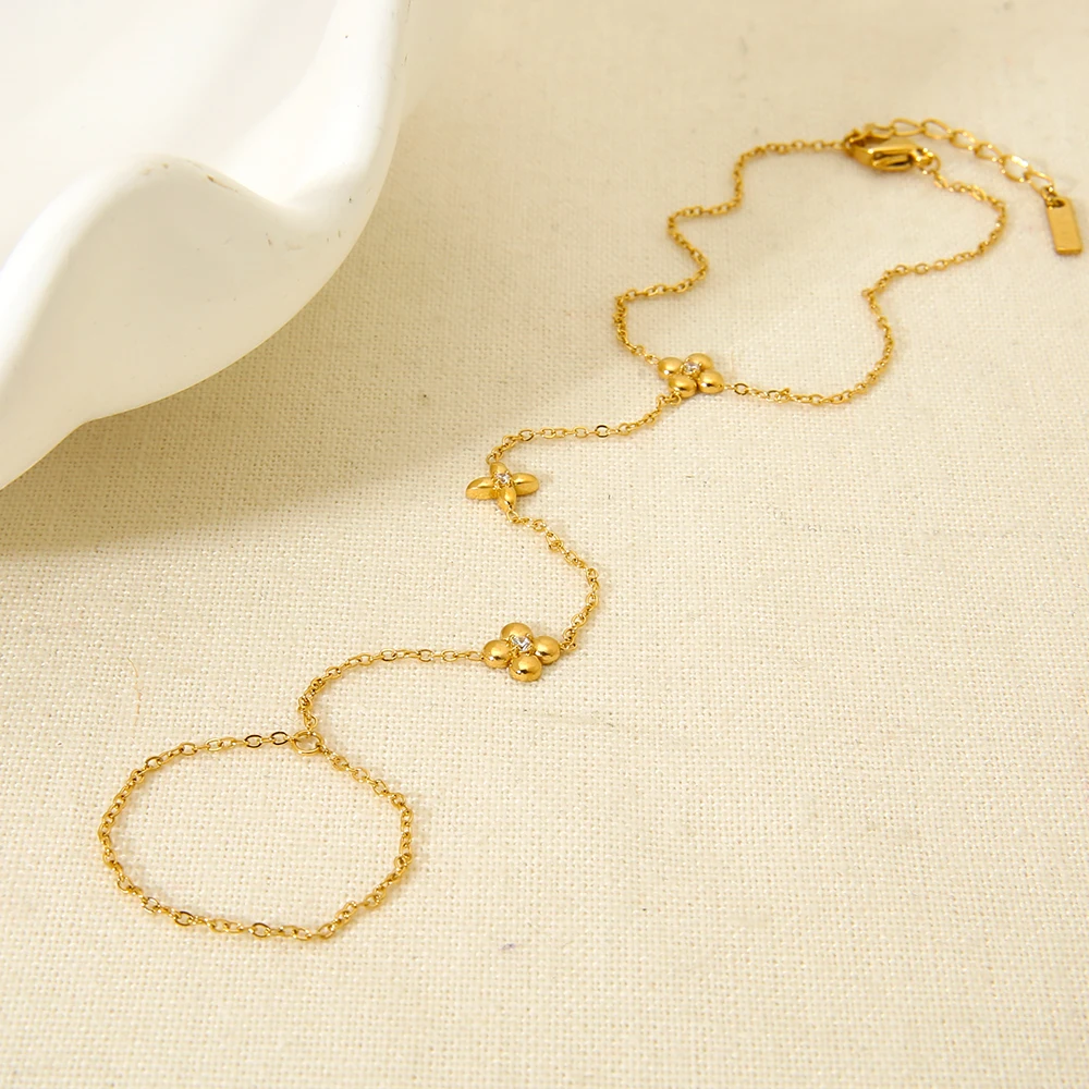 

Minimalist Cubic Zirconia Flower Star Rings Bracelet 18K Gold Plated Stainless Steel Integrated Chain Hand Jewelry for Women