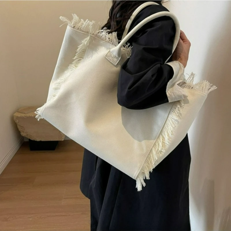 

Relaxing Large-capacity Canvas Handbag ,Trendy Style, Versatile for Both Work and Casual Wear Single-shoulder Crossbody Tote Bag