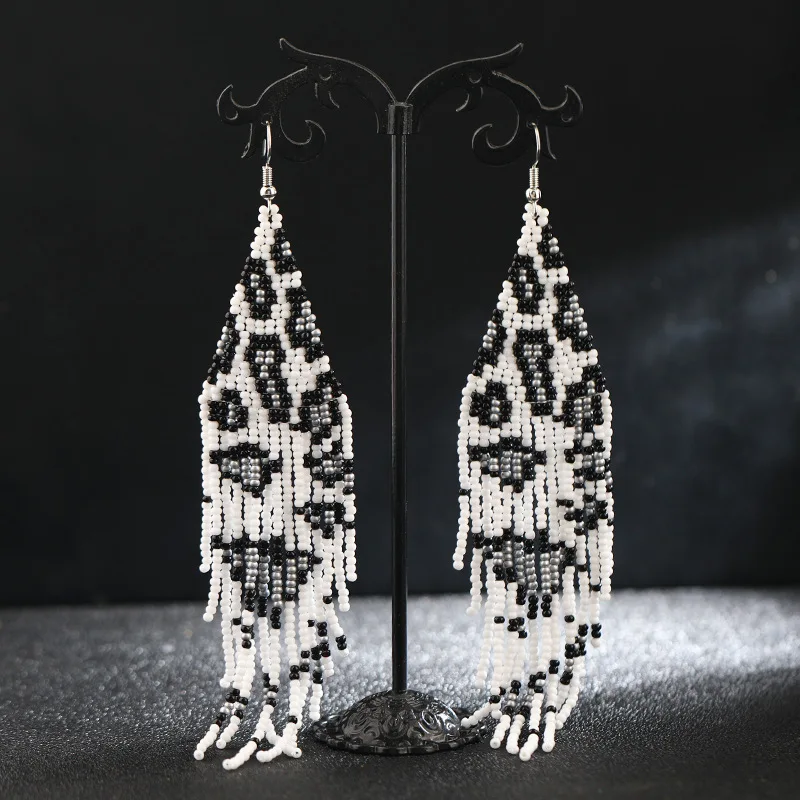 Bohemian tide Fashionable Individuality Temperament Handwork Meter bead Leopard print series Tassel Long pattern Earrings