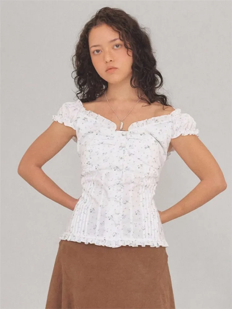 Koreanische Nischenbluse mit Blumenmuster und Holzohr-Kragen, ärmellos, für Damen, trendige und jugendliche Schlichtheit, T-Shirt, Sommer, schlank geschnittenes Oberteil