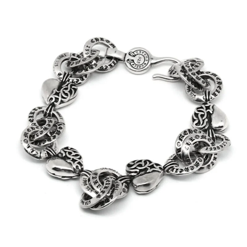 

Gothic .925 Silver Bracelet with Engraved Chain & Ornate Heart Motif Links