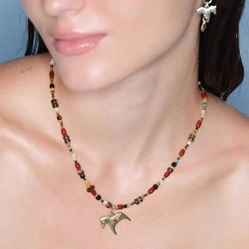 Fantasy pony beaded necklace temperament light luxury versatile high-end sweater chain niche design pony pendant woman