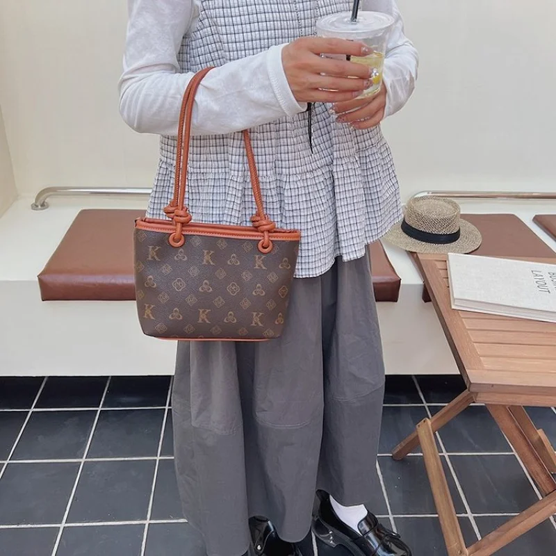 

Высококачественная минималистичная уникальная винтажная кожаная сумка через плечо для женщин, повседневная деловая сумка для отдыха, модный дизайн с логотипом