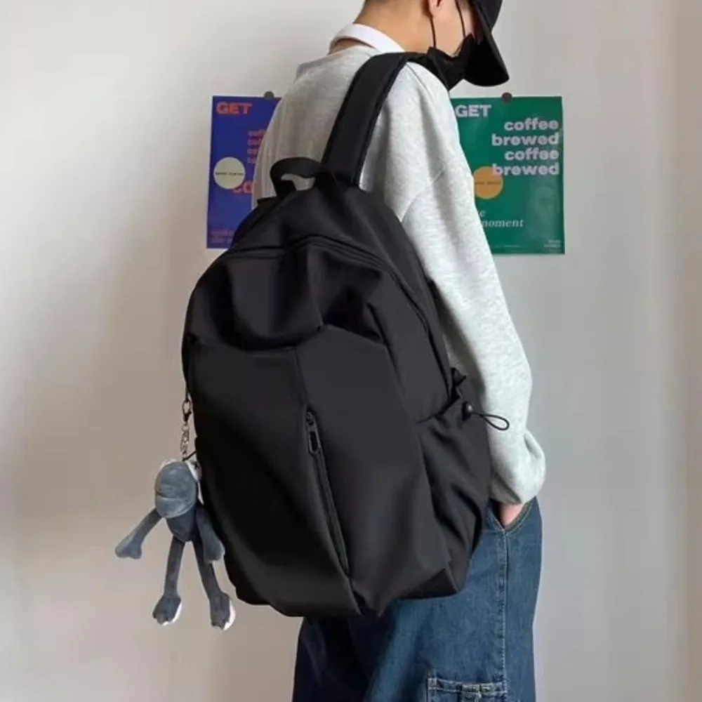 حقيبة ظهر عصرية مقاومة للأوساخ للكمبيوتر بسعة كبيرة بلون سادة حقيبة مدرسية للطلاب كاجوال بسحاب حقيبة كتف للسفر للنساء