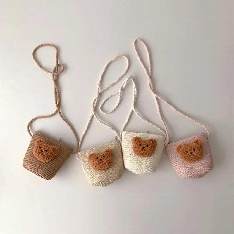 เกาหลีน่ารักหมีเด็กCrossbodyกระเป๋าฤดูร้อนHandmadeทอฟางไหล่กระเป๋าสําหรับสาวท่องเที่ยวกลางแจ้งเด็กกระเป๋าถือเหรียญ