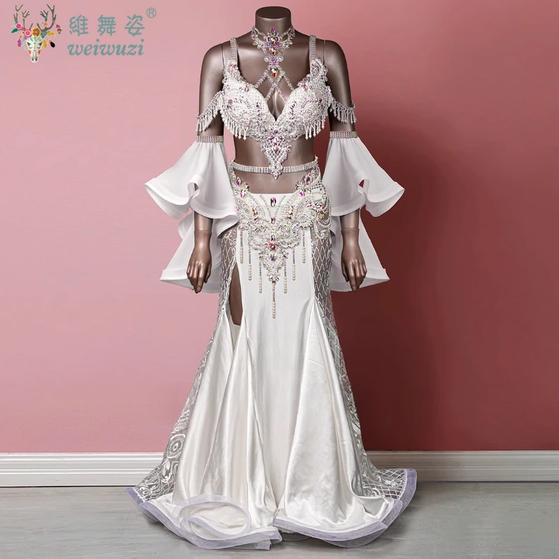 

Костюмы для соревнований танцовщицы живота на заказ для пожилых людей Бюстгальтер с камнями AB + рукава + сексуальная длинная юбка «рыбий хвост» 3 шт. Комплект для танцевальных выступлений