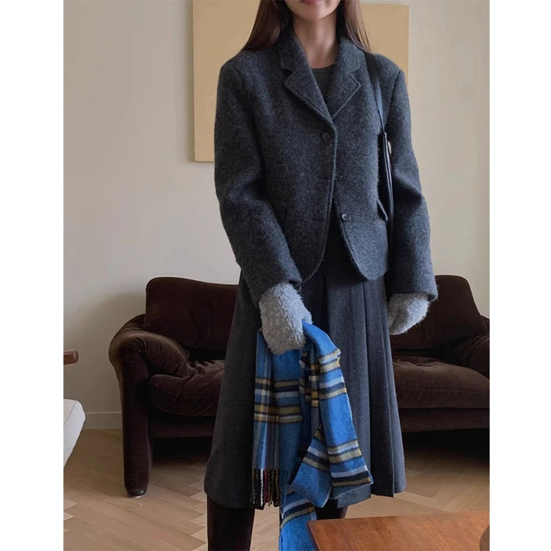 

Retro Commuter Korean Dongdaemun 24 Autumn awl Collar Trench Coat Woolen Suit Jaet plus Pleated Skirt Women's Faion