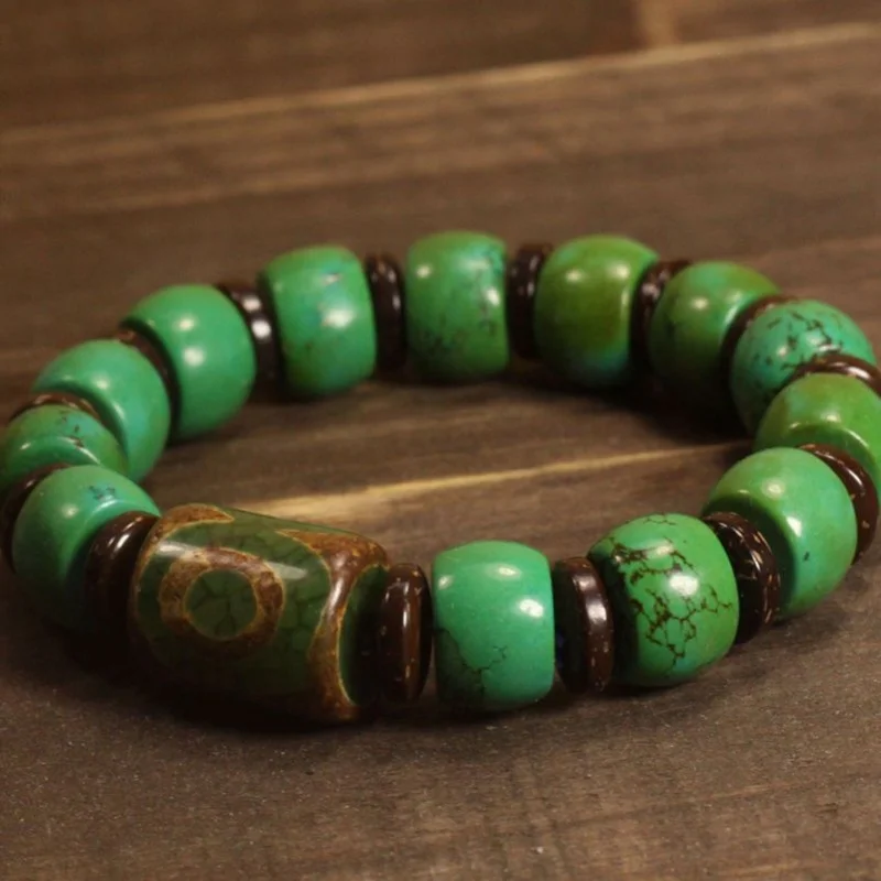 

Браслет из натурального бирюзового камня с бусинами дзи с тремя глазами, мужской аксессуар в античном стиле.