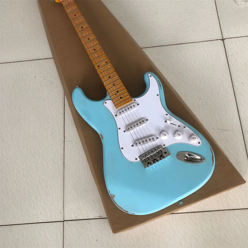 

Stock, blue relic electric guitar. Frosted matte, Korean hardware. Brass string pillow, factory wholesale and retail, free shipp