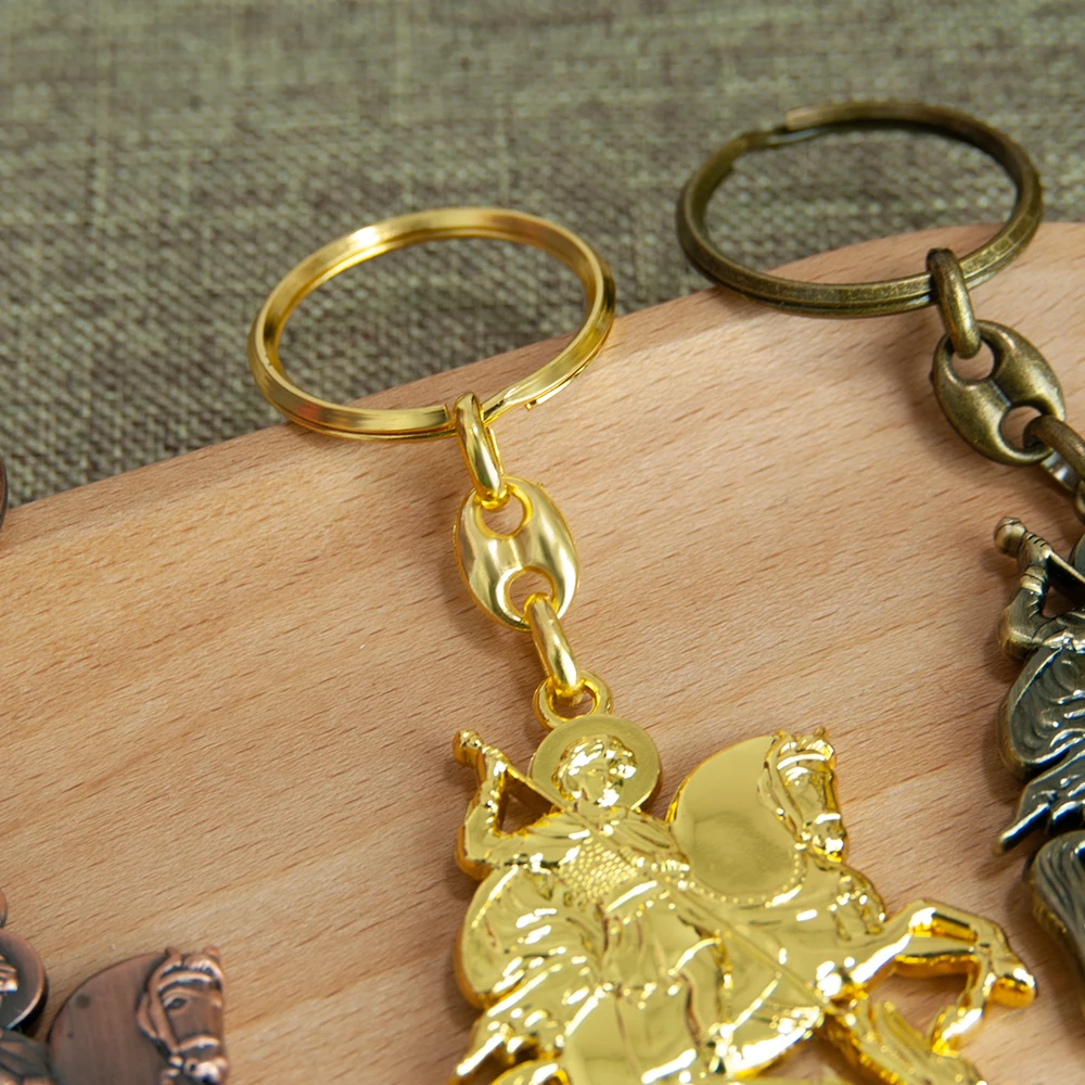 พวงกุญแจคริสเตียน HTISOK นักบุญจอร์จกำลังกำจัดมังกร จี้โลหะ พวงกุญแจ แหวนพวงกุญแจ เครื่องประดับ ของขวัญสำหรับผู้ศรัทธา