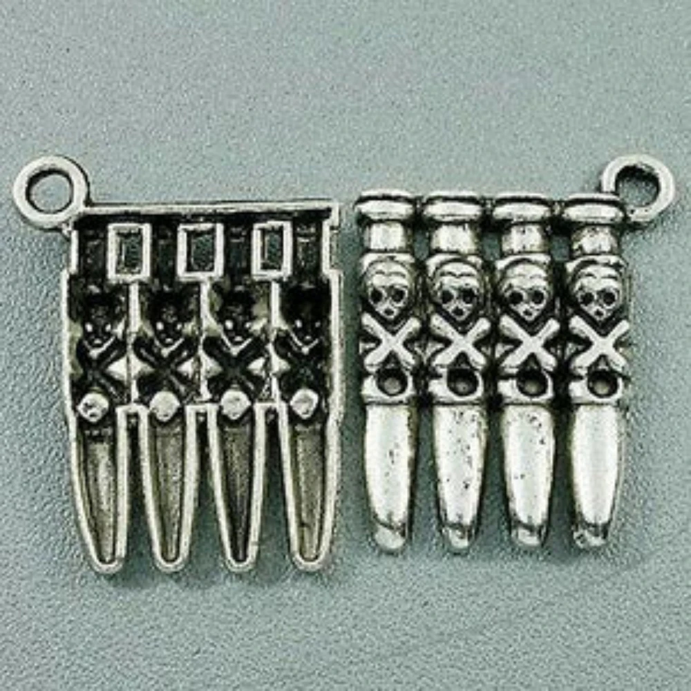 7PCS TIBETAN SILVER 4 CARTRIDGE BELT HEAD CHARMS H0578