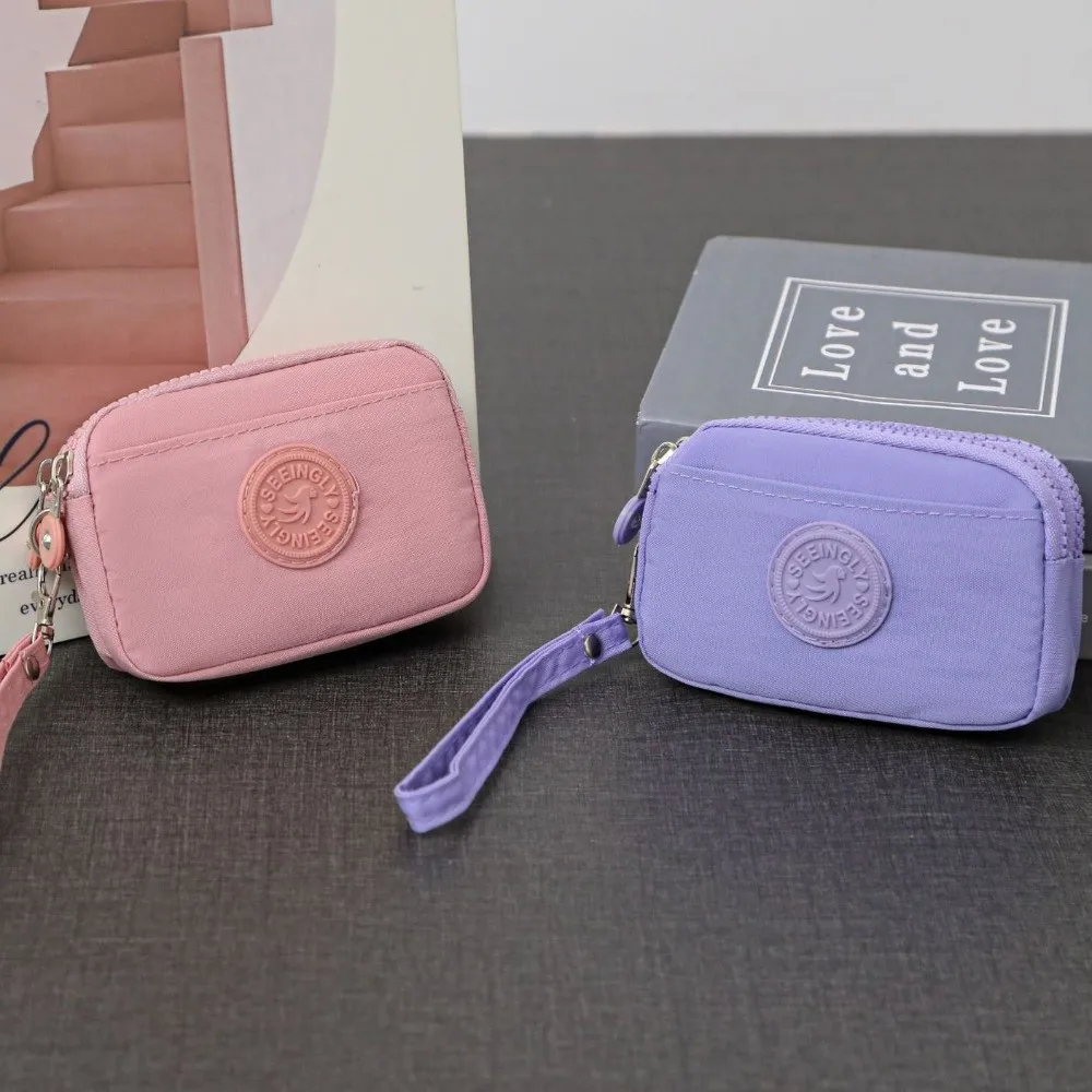 Dompet Wanita Warna Solid Portabel dengan Tali Penyandang Tempat Kartu Kredit Lapisan Ganda Dompet Koin Nilon Tahan Air Wanita