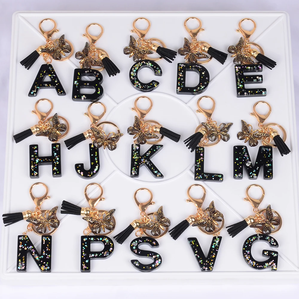Schmetterlings-Schlüsselanhänger & Schlüsselketten, Alphabete, Niedliche Coole Stern-Pailletten, Harz-Schlüsselanhänger für Männer und Frauen, Taschen-, Rucksack-Charm