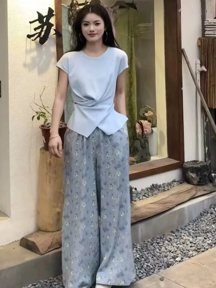 

2025 Summer Stylish Aging Irregular Knitted T-shirt Top+Floral Print High Waist Wide Leg Pants Commute Two Piece Set