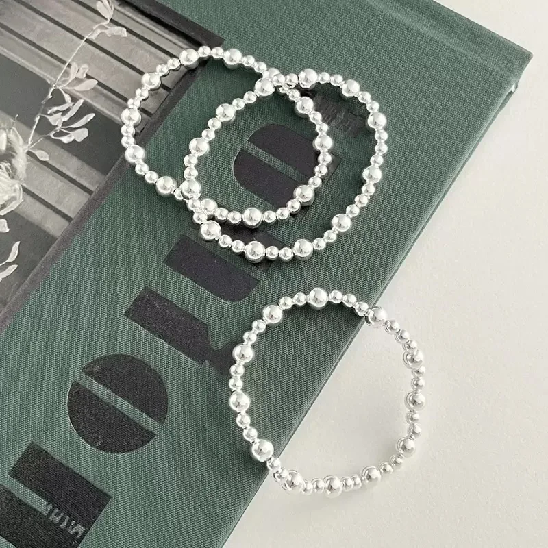 สร้อยข้อมือเงินแท้ 925 ประดับลูกปัดทรงกลม ของขวัญวันเกิด เครื่องประดับเงิน สร้อยข้อมือแบบยืดได้ รุ่นใหม่