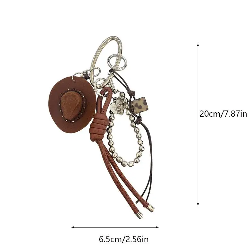 Glücksbringer Cowboyhut Schlüsselanhänger, handgeflochtenes Seil, Kunstleder-Anhänger, Western-Glücksbringer-Deko für Autoschlüssel, Geldbörse, Rucksack-Zubehör – Detail 1