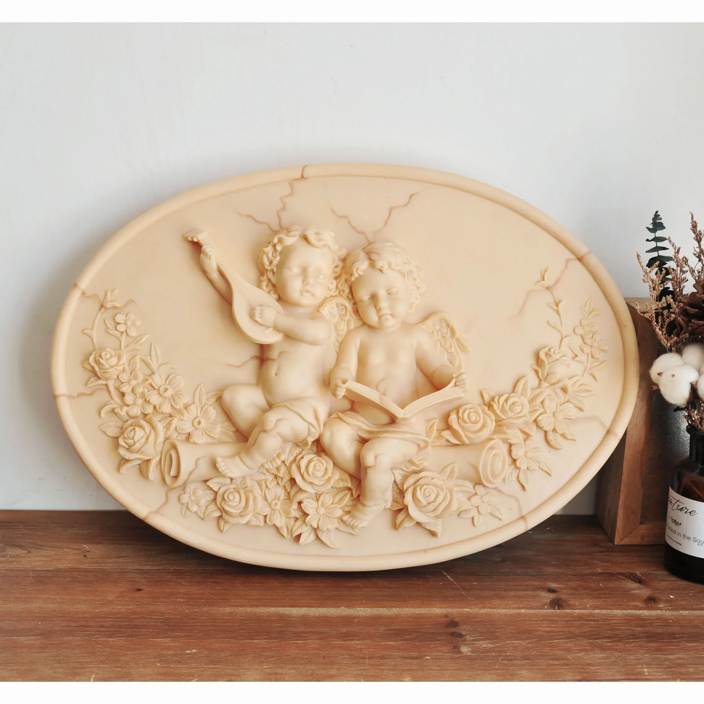 European Retro Style Angel Cherub Relief Wall Decor Oval Resin Sculpture with Rose Flower Pattern for Aesthetic Home Decoration