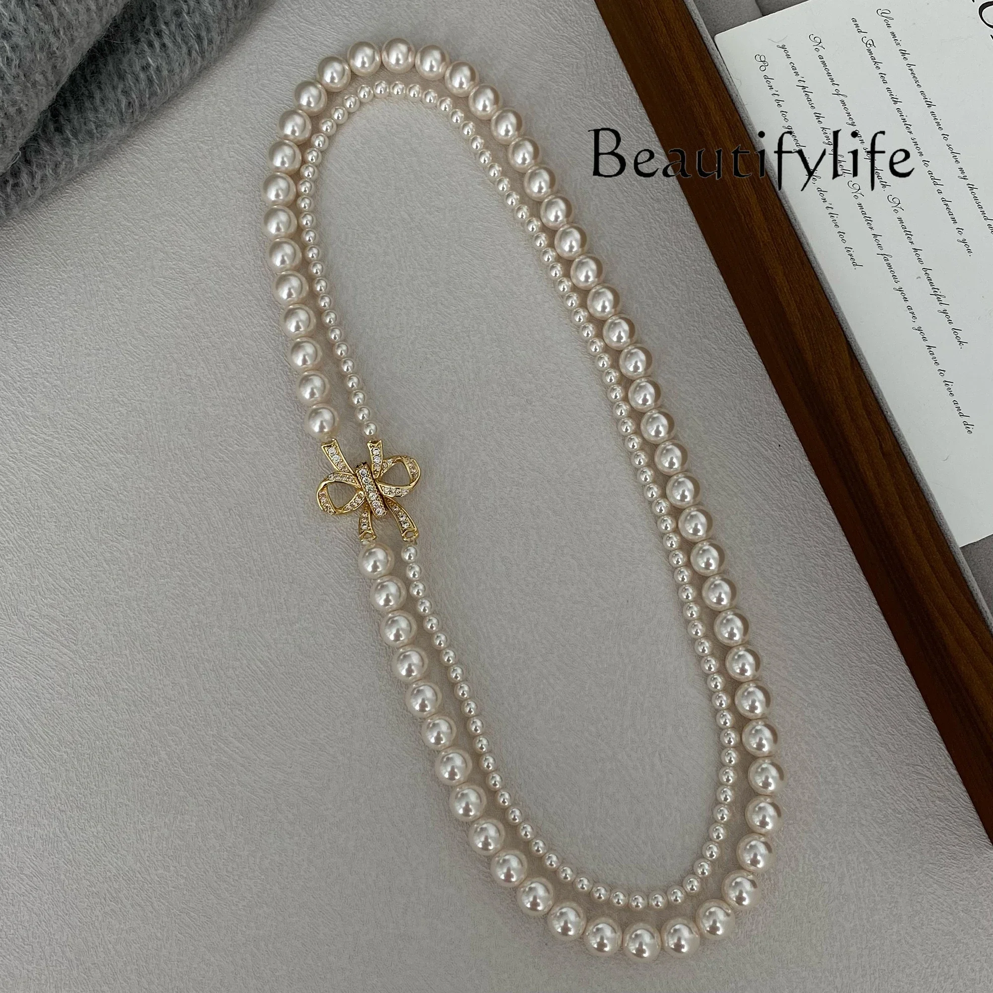 

Multi-layer pearl necklace stacked wearing new high-end autumn and winter sweater chain women's skirt jewelry