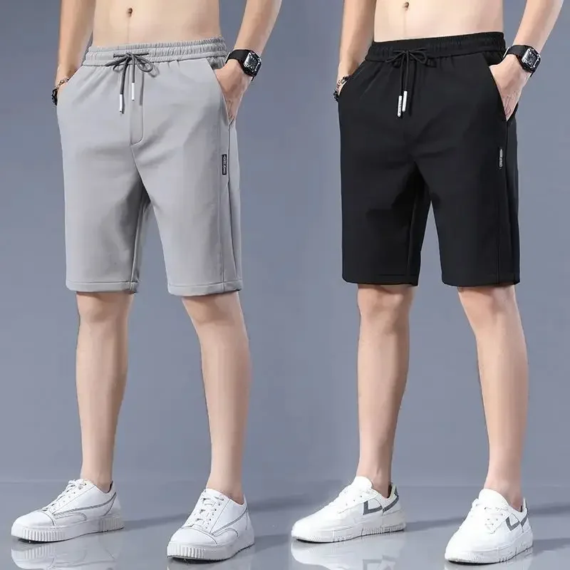 High Quality Polyester Ice Silk Shorts Men 2024 New Korean Version Of Loose Elastic Splicing Beach Five Minute Medium Pants