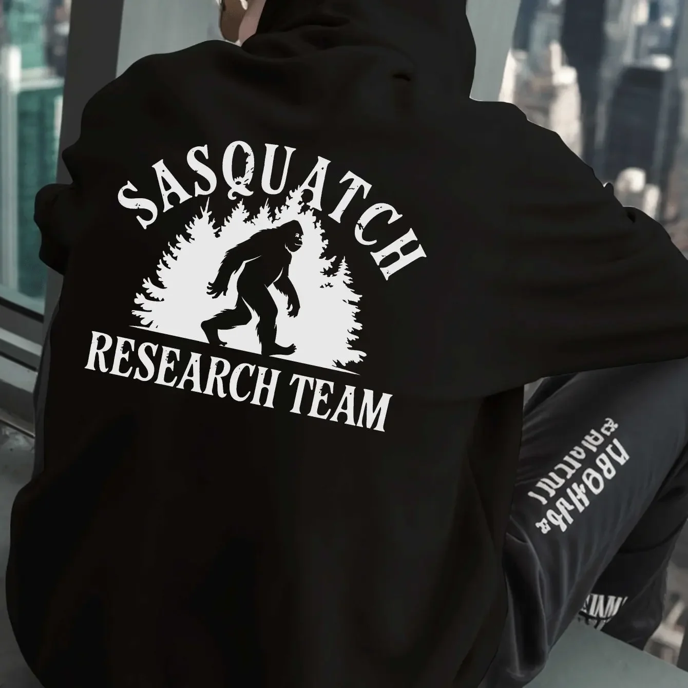 Men Solid Black Oversized Hoodie Vintage Worn Letter Sasquatch Bigfoot Forest Research Team Back Graphic Camping Sweatshirt