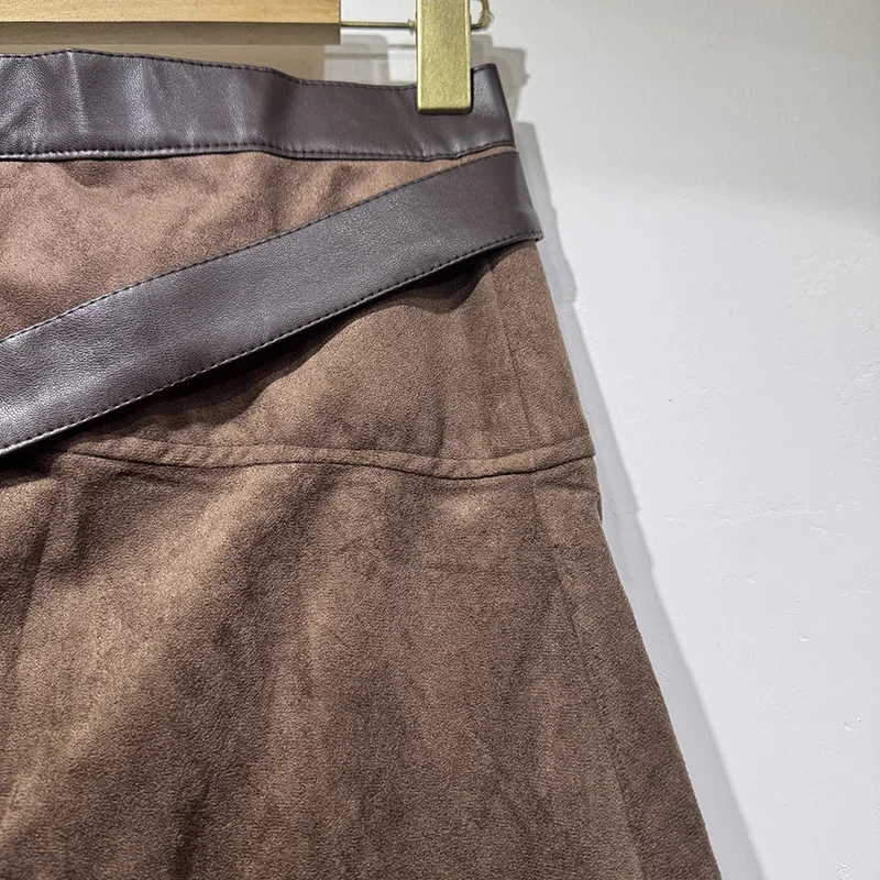 تنورة ميدي غير متناظرة من جلد الغزال على طراز شارع العليا تنورة عالية الخصر بحاشية منتفخة على شكل حرف a تنورة نسائية عصرية متعددة الاستخدامات للتخسيس