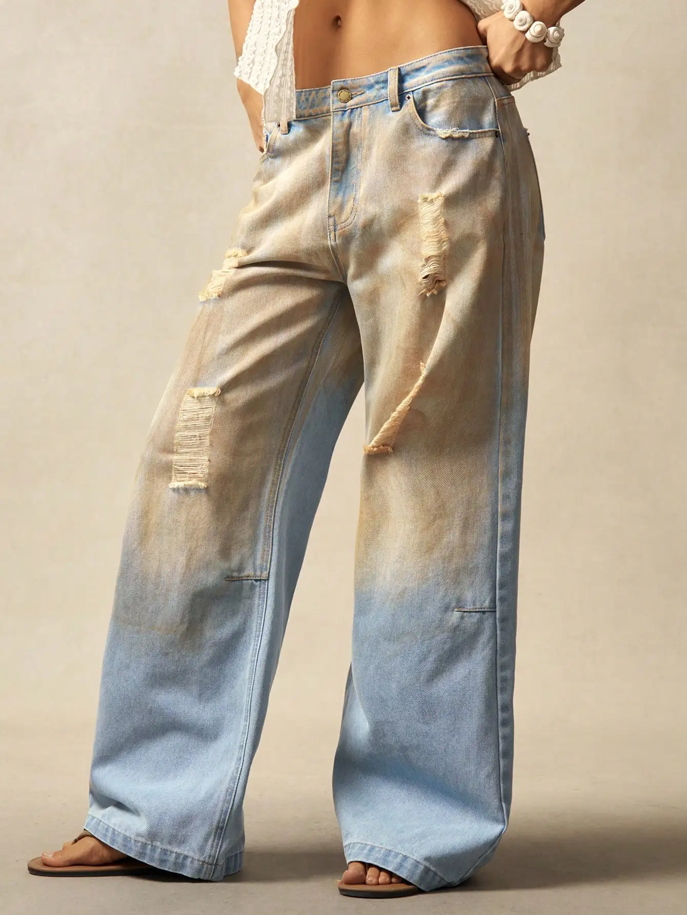 Pantaloni da donna in denim con foro sbiadito in stile streetwear di fascia alta in stile americano, nuova collezione 2025