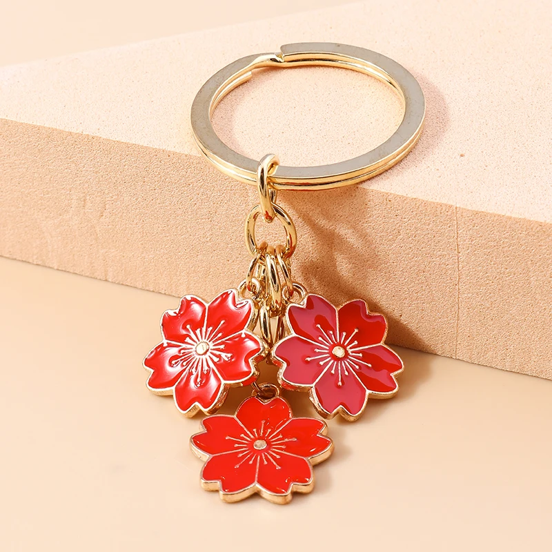 Aihua 40 Farben Niedlicher Pflanzen-Schlüsselanhänger Emaille Sakura-Blumen-Schlüsselanhänger für Frauen Mädchen Handtasche Anhänger Autoschlüsselhalter DIY Schmuck Geschenke – Detail 21