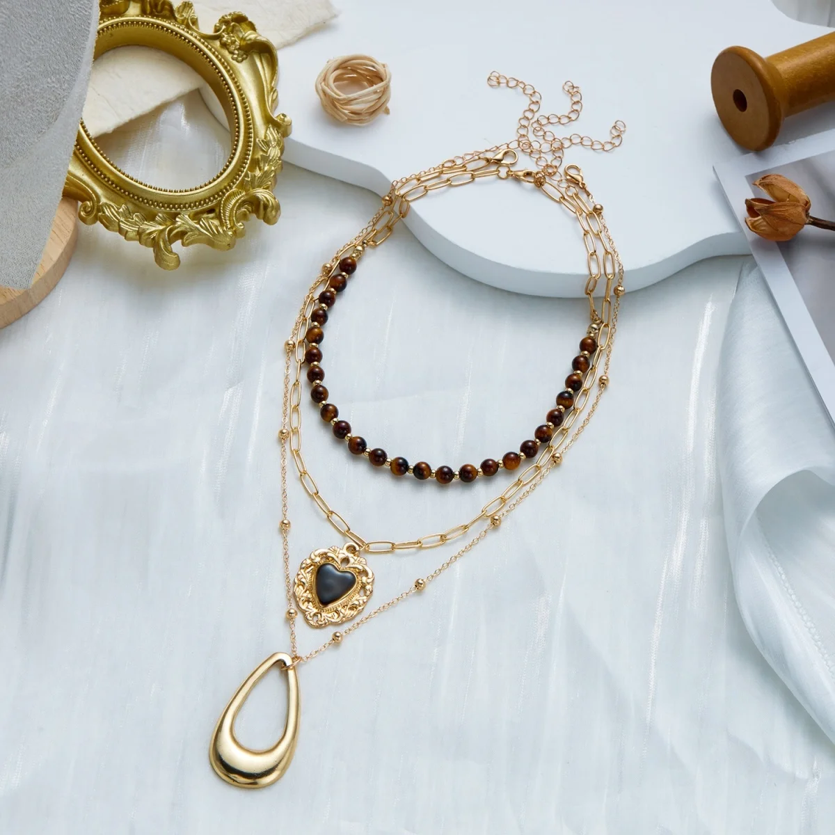 Retro Natürlicher Tigerauge-Stein Herz Hohler Wassertropfen Anhänger Halskette für Frauen Männer Mehrschichtige Tropfenform Stapelbare Choker-Schmuckstücke – Detail 28