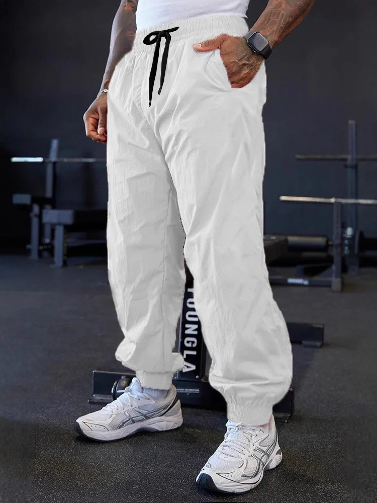 Spring and Autumn Men's Outdoor Sports Lightweight Stretch Pure-Color Training Pants, Fashionable Sports Loose-Cuffed Long Pants
