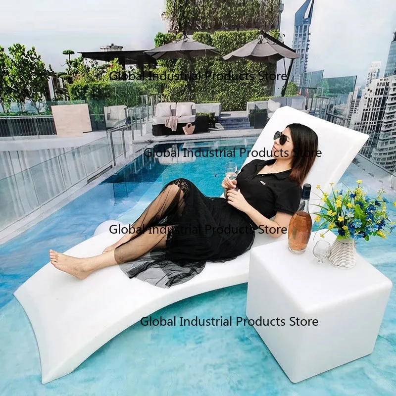 

White fiberglass ergonomic oversized beach loungers swimming pool wet deck ledges water sun loungers outdoor