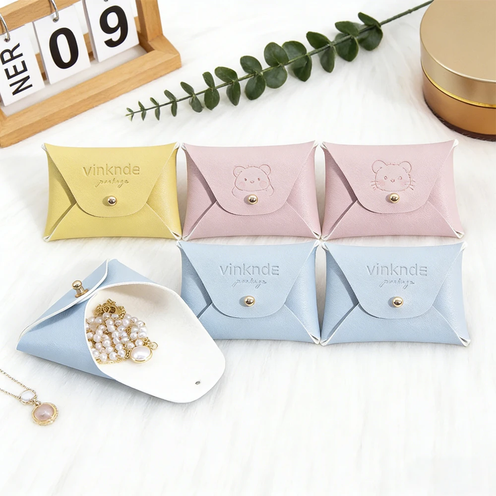 

Custom Logo 7x5cm Cute Mini Leather Jewelry Pouch Portable Travel Jewellry Storage Bag with Button Closure for Earrings Rings