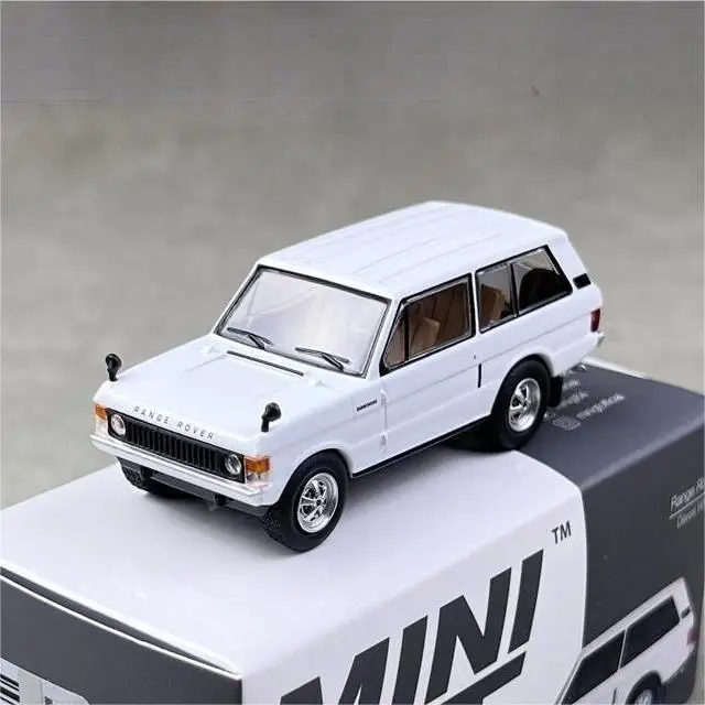 ของขวัญชุดจัดแสดงโมเดลรถยนต์คอลเลกชัน TSM MINI GT 1/64 minigt 658 Range Rover Davos โลหะผสมหล่อขึ้นรูปแบบขาว