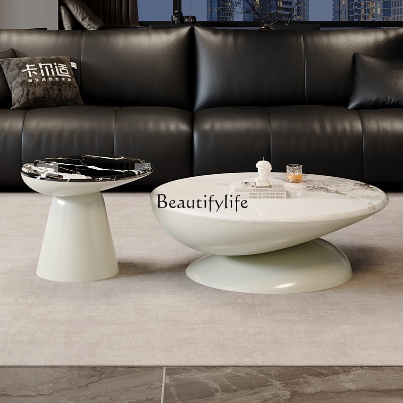 

Italian minimalist round rock slab coffee table home designer high sense modern light luxury coffee table