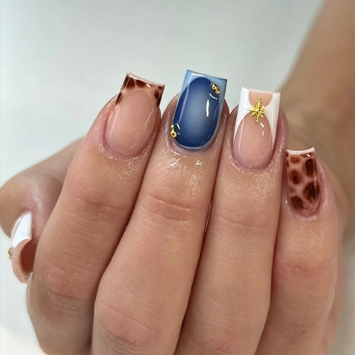 

24PCS Blue Tortoiseshell Press on Nails French False Nails with Gold Star Decor Short Square Acrylic Nail Tips for Daily Casual