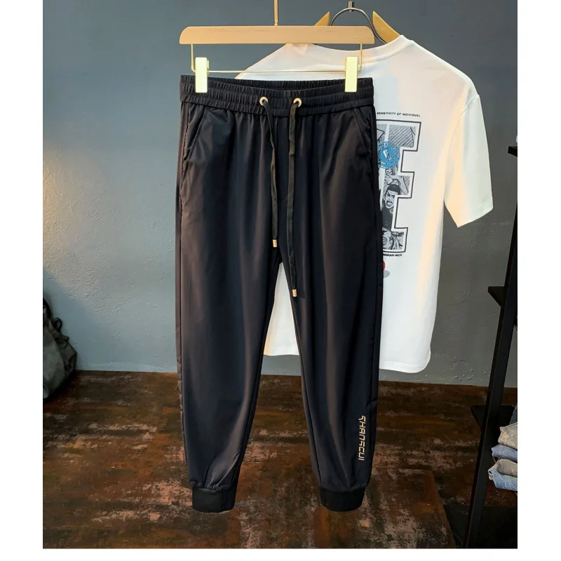 

Summer thin ice silk casual pants for men, 2025 new fashionable breathable drawstring leg tied sports pants