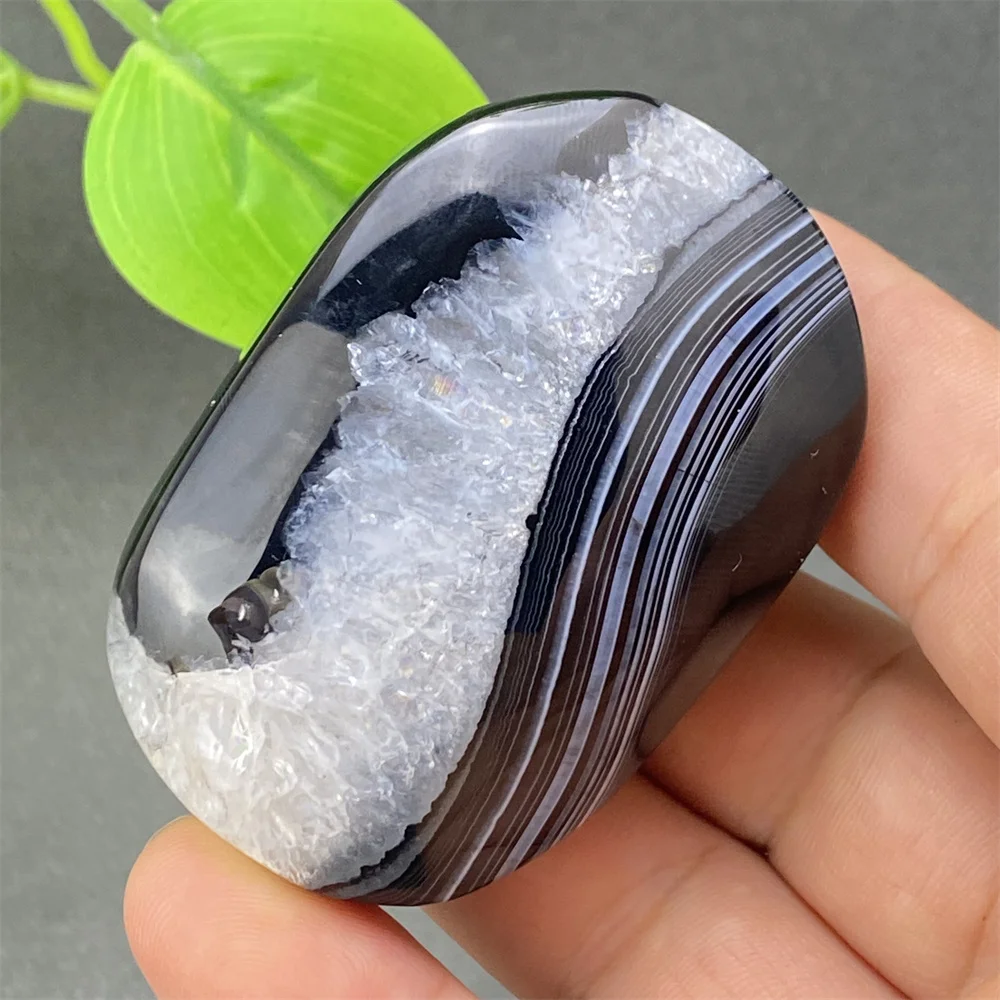 

Natural Striped Black Agate Hand Polished Magic Degaussing Home Decoration