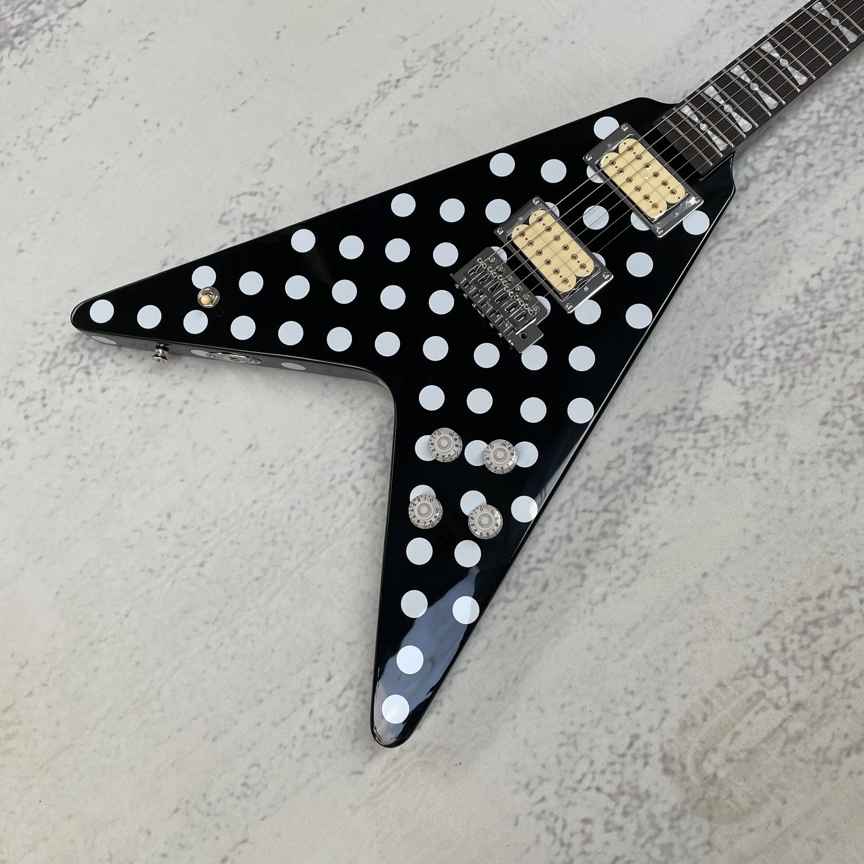 V Shape Electric Guitar, Black with White Polka Dots, Dual Gold Closed Humbuckers, Chrome Tremolo, Block Inlays, 22 Frets