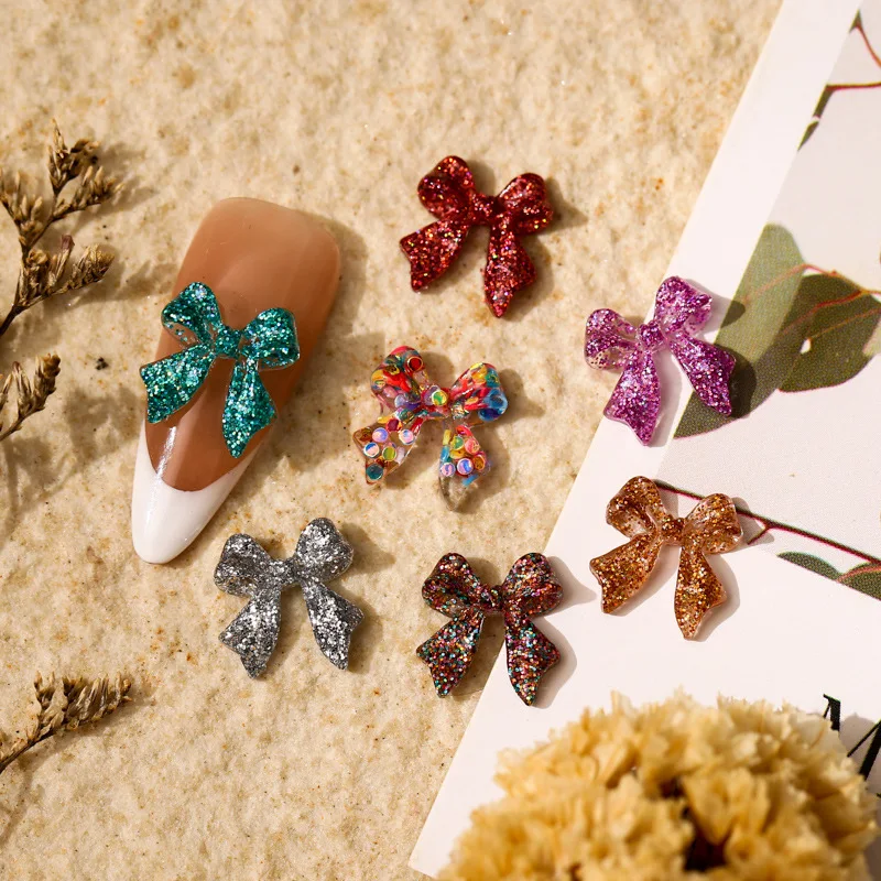 

50Pcs Sequin Bow Knot Nail Art Charm 3D Sparkling Dreamy Clear Rainbow Sequin Bow Nail Ornament DIY Exquisite Nail Accessories