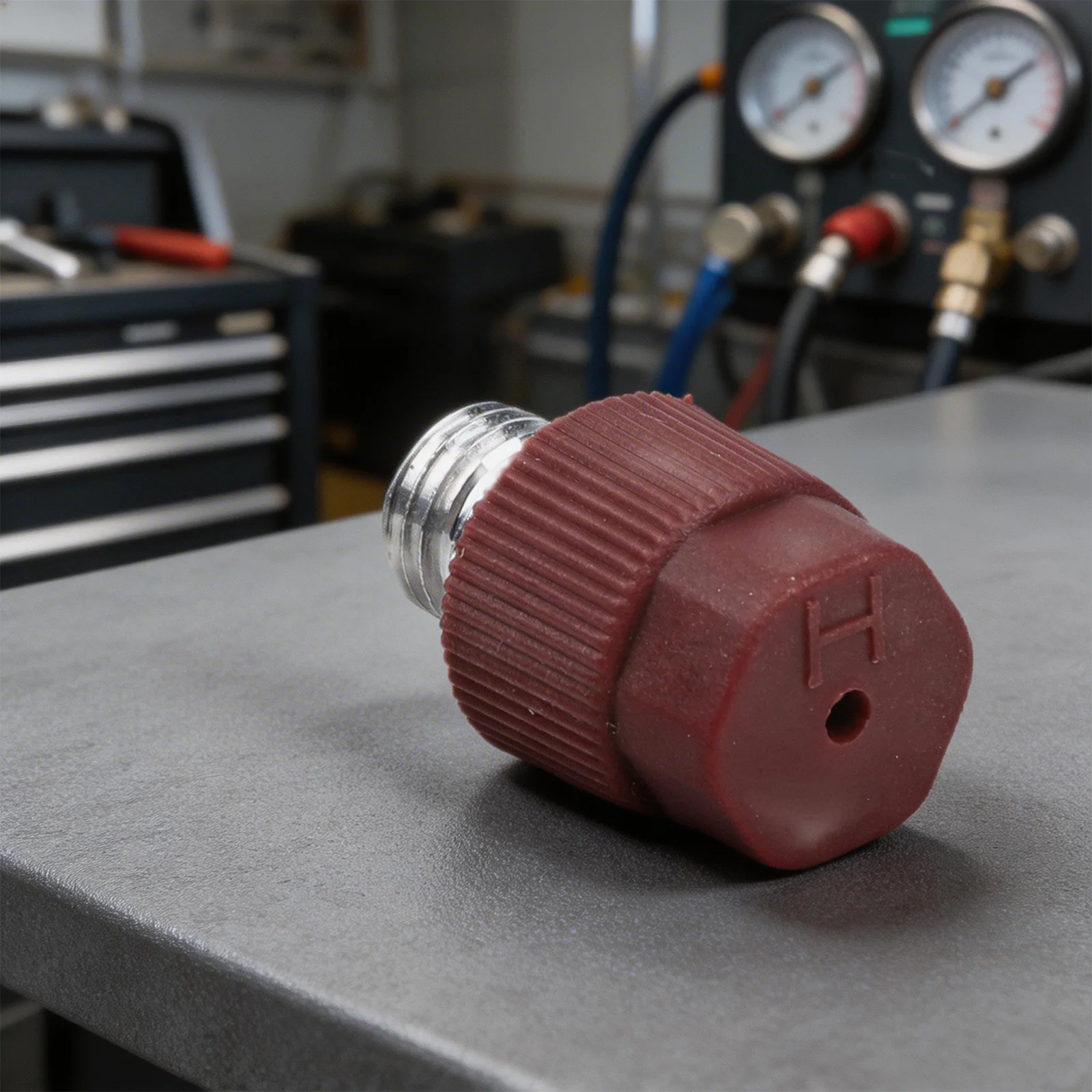 

R-134a High Side A/C Service Adapter with Replaceable Valve Core Designed to Eliminate Leakage on Vehicle Systems