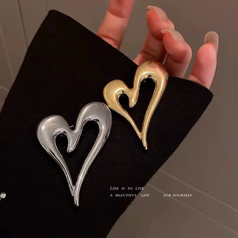 

Fashion Personality Geometric Hollow Out Heart Brooch For Women And Men Coat Suit Ornament Buckles Jewelry 2025