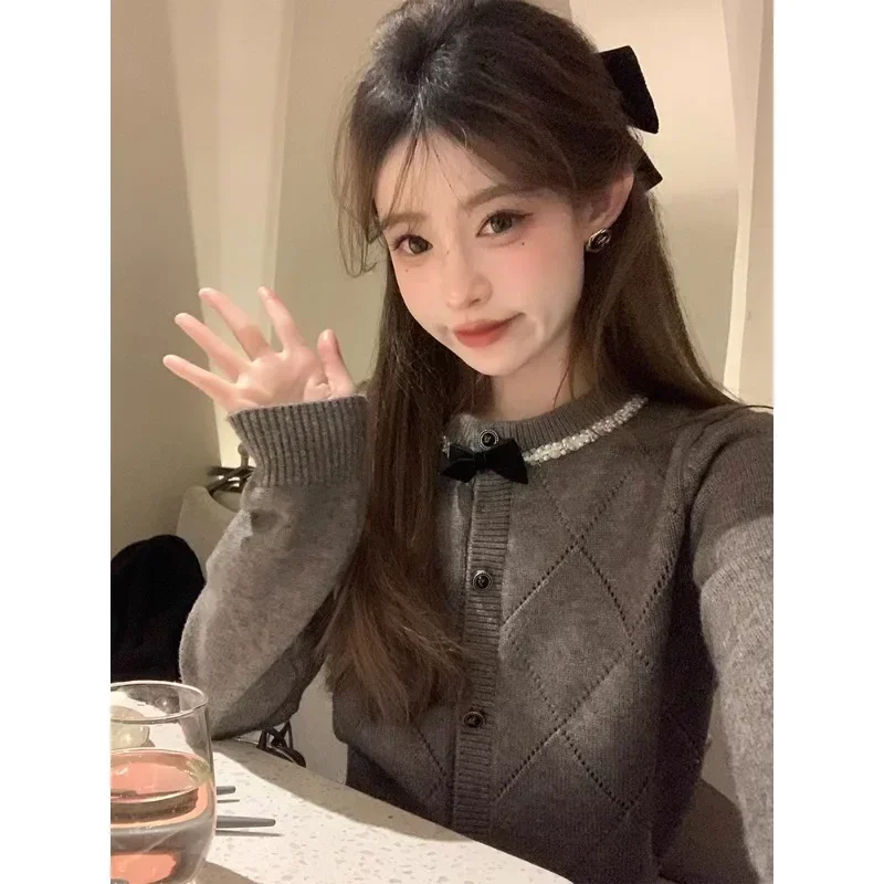 ถักเสื้อสเวตเตอร์ถักผู้หญิง PURE Lust สไตล์สีดํา LACE-up Bow ฤดูใบไม้ร่วงใหม่ SLIM FIT เอวสั้นเสื้อกันหนาว Keep WARM ยืดเล็กน้อย