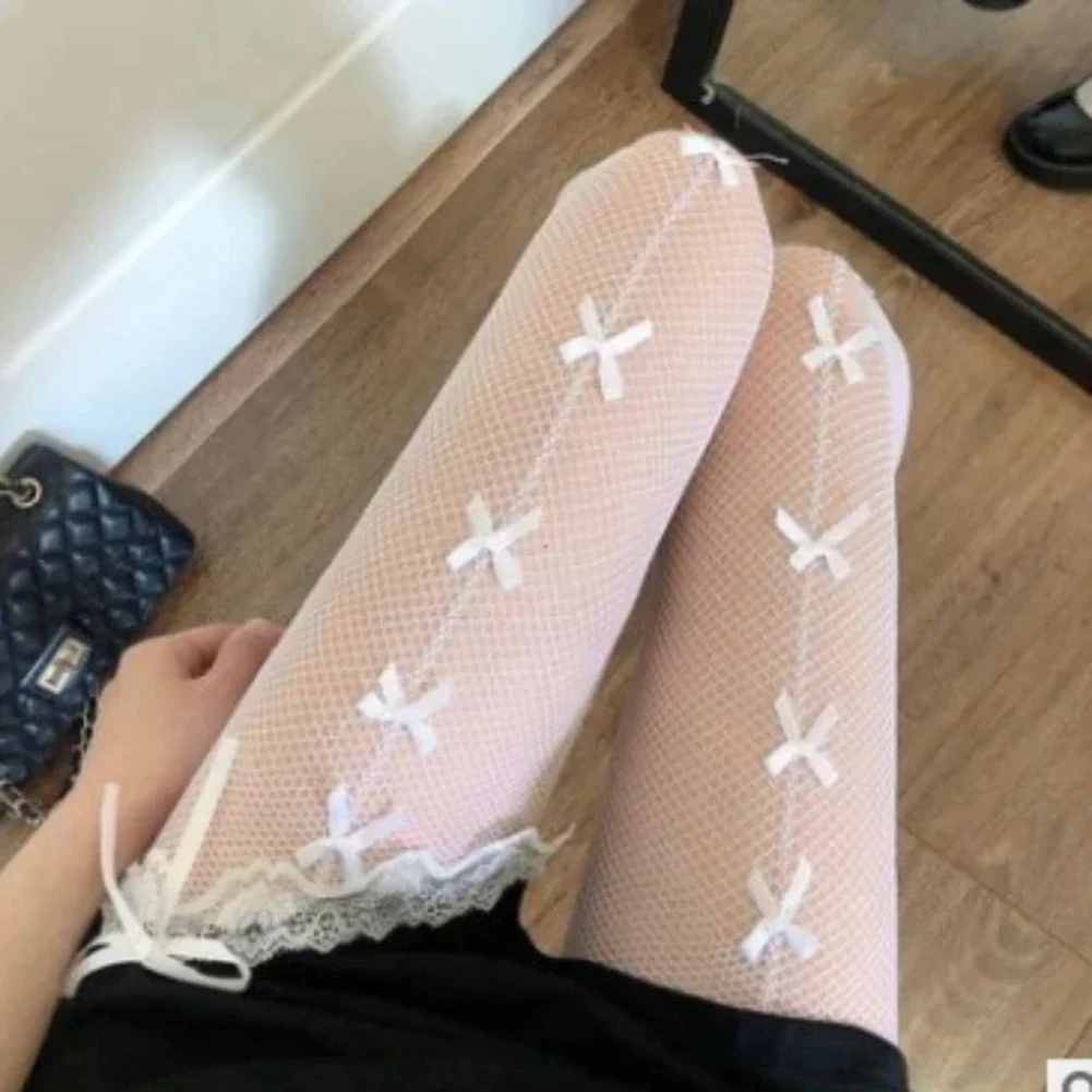 

Kawaii Gothic Hollow Out Pantyhose Lolita Bow Knot Fishnet Stockings Women Spicy Girl Black White Sexy Thin Ins Tide Lace Tights