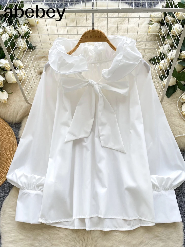 Elegancka bluzka z falbankami, stójką, długim rękawem i motywem motyli, w stylu vintage, luźna, francuska, idealna do biura, w stylu high street, na jesień 2026.